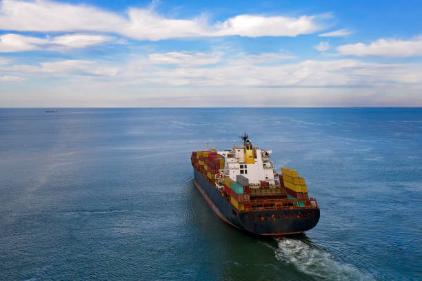 istock Aerial view of cargo ship in transit. 1266441667