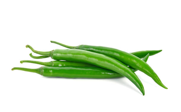 istock Green hot chili peppers isolated on white 1266443109
