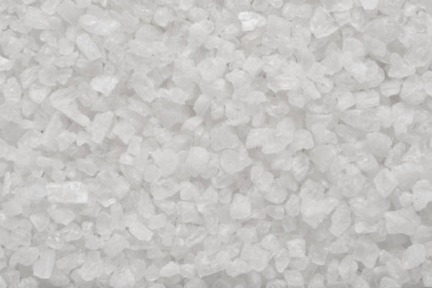 istock Sea salt granules close-up macro shot background or texture 1266444815