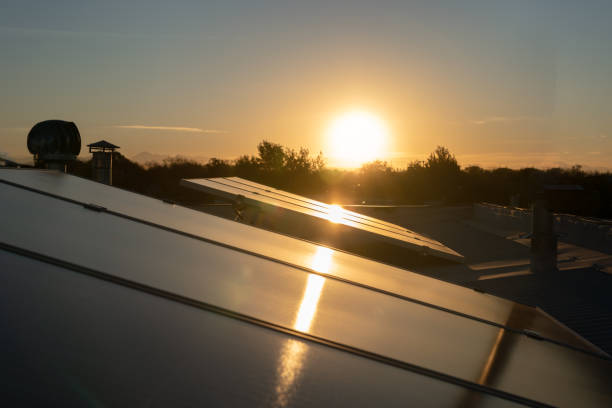 istock Solar energy panels against sunset sky 1266450930