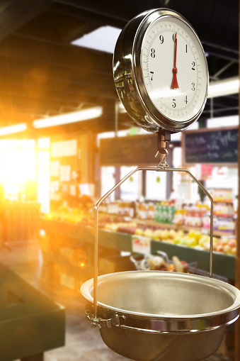 Weighing scales in supermarket with lens flare