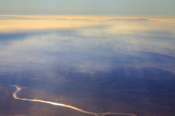 istock Aerial view of mountains and river meander 1266459937