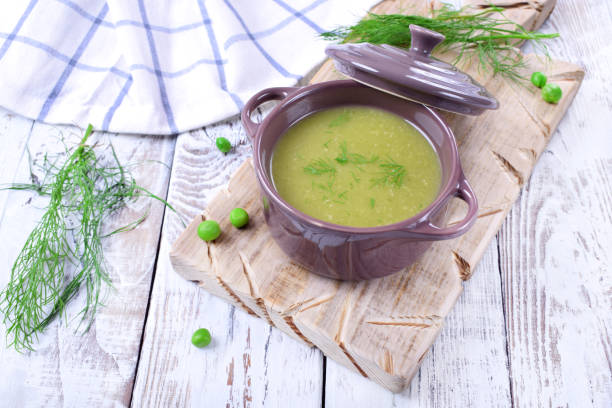 istock Vegetable pureed soup with asparagus and green peas 1266461413