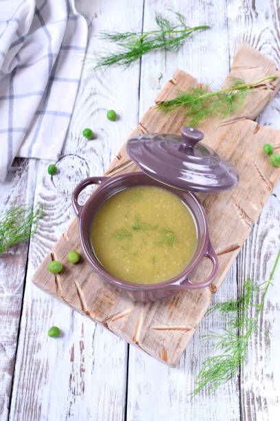 istock Vegetable pureed soup with asparagus and green peas 1266461417