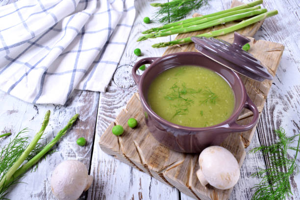 istock Vegetable pureed soup with asparagus and green peas 1266461434