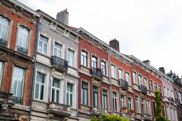 istock Different colored brick row houses in Brussels Etterbeek 1266464773