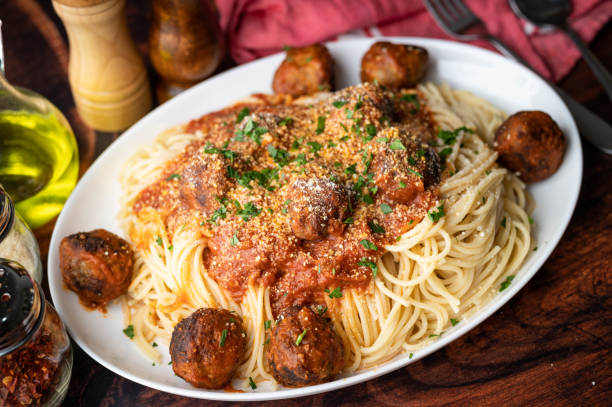 istock meatball spaghetti with tomato sauce 1266465545