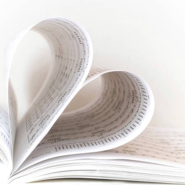istock Sheets of musical notes in the form of a heart 1266468599
