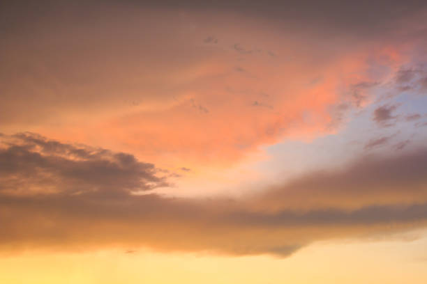 istock An orange and yellow sky with clouds. , Beautiful sky 1266472210
