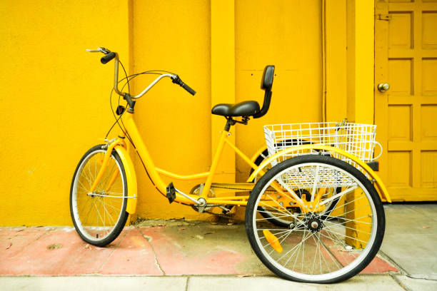 istock Yellow Bike on a Bright Yellow Background 1266472274