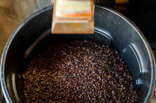 istock Coffee beans is roasting in roaster machine in coffee shop. 1266474090