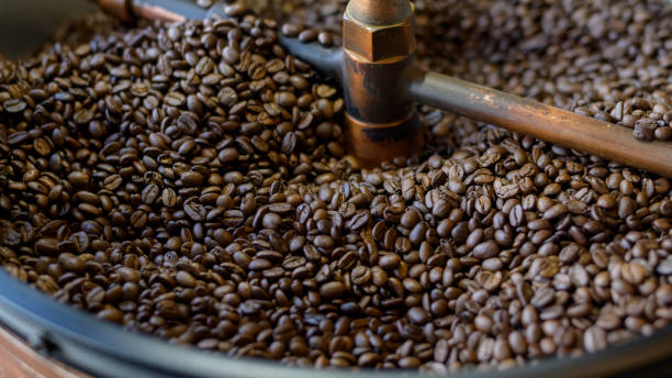 istock Coffee beans is roasting in roaster machine in coffee shop. 1266474098