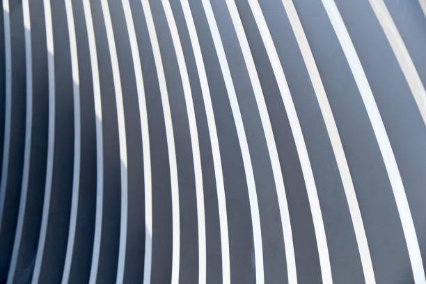 istock Abstract metallic lines with sun shadow. Close up 1266477728