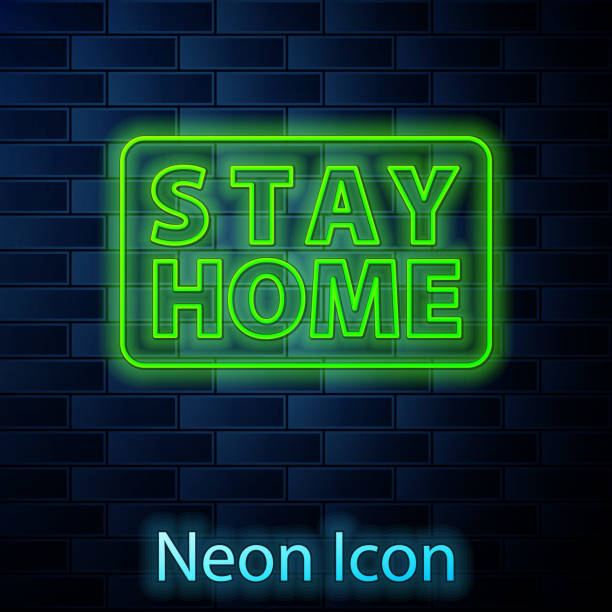 istock Glowing neon line Stay home icon isolated on brick wall background. Corona virus 2019-nCoV. Vector 1266480306