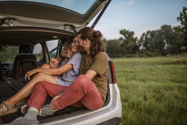 istock Couple In the back of their van 1266481378