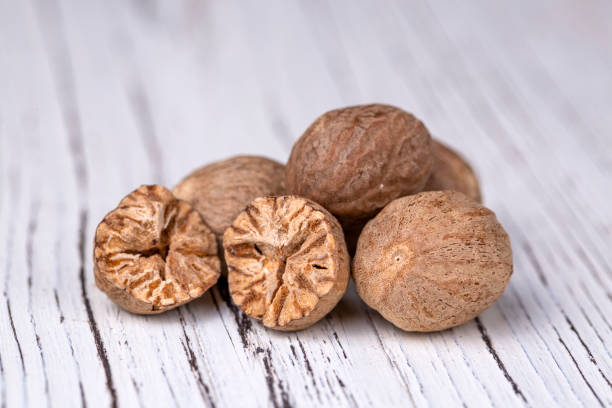 istock Nutmeg spice isolated on the white background 1266483211