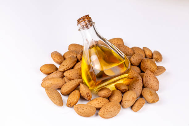 istock Almond oil on the white background 1266485310