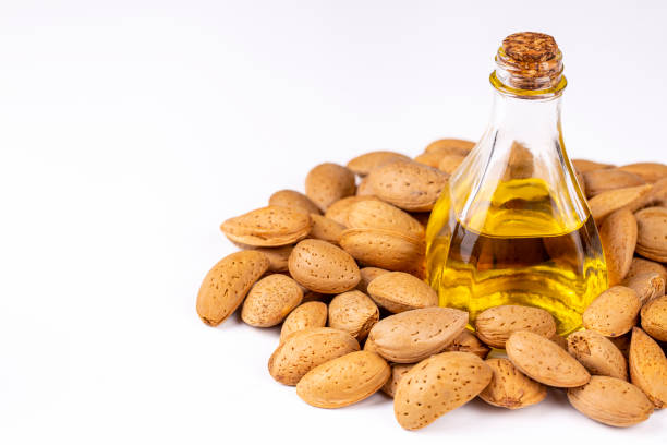 istock Almond oil on the white background 1266485315