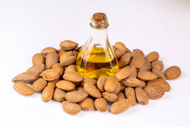 istock Almond oil on the white background 1266485330