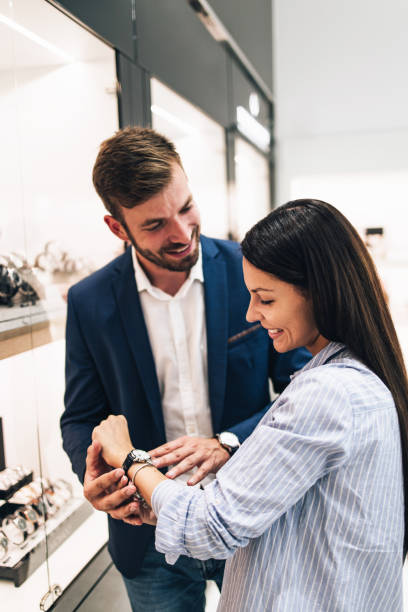 istock Middle age couple in jewelry store 1266487235