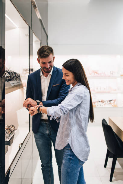 istock Middle age couple in jewelry store 1266487243