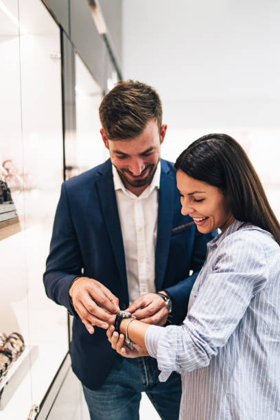 istock Middle age couple in jewelry store 1266487245