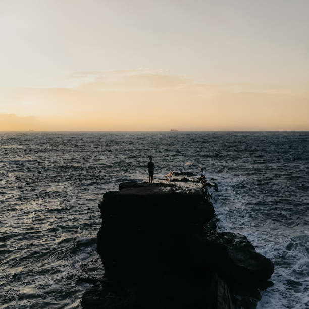 istock sunset in the middle of the ocean 1266489868