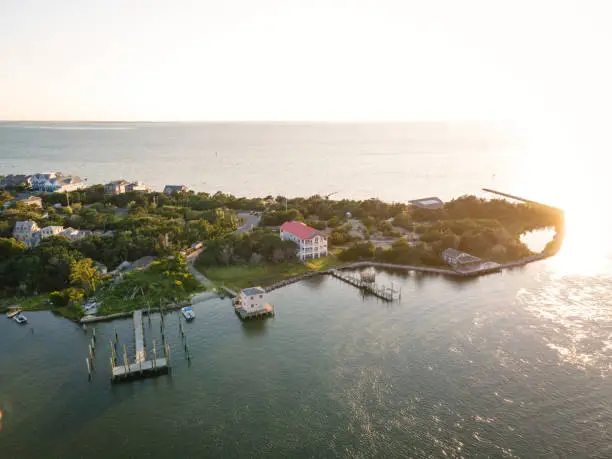 Aerial view of Silver Lake harbor and Ocracoke village on Ocracoke Island, North Carolina at golden hour.