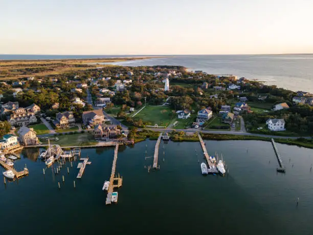 Aerial view of Silver Lake harbor and Ocracoke village on Ocracoke Island, North Carolina at golden hour.