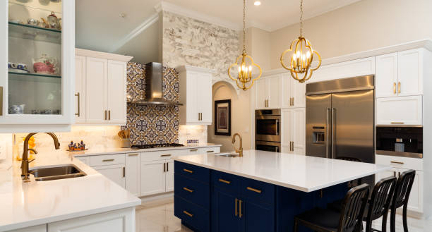 White Kitchen Design Beautiful luxury estate home kitchen with white cabinets. appliance photos stock pictures, royalty-free photos & images