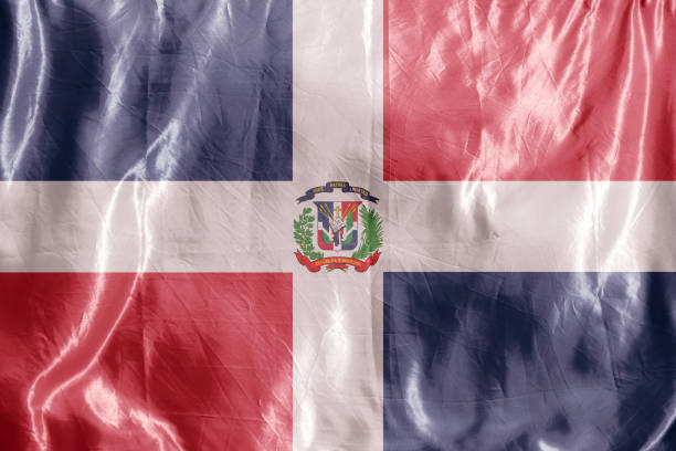 State flag fluttering in the wind. Colored background on textiles