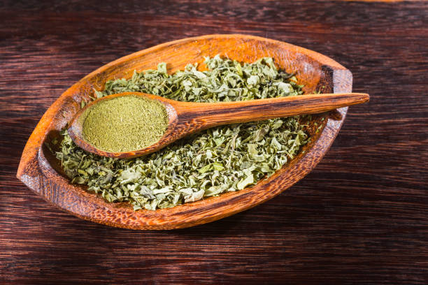 istock dried leaves and moringa powder 1266500257