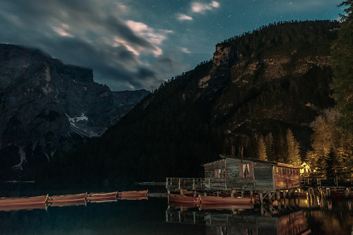 Landscape with Braies lake by night in Dolomites mountains, Italy