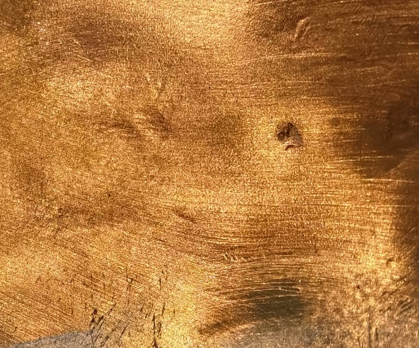 istock Copper texture background. Bronze texture. Beautiful bright color of metal. Shine, gradient and overflow of shades. Structural defects 1266501149