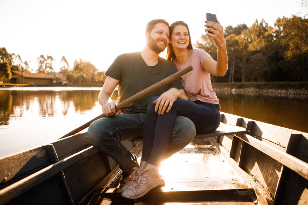 istock romantic couple in rowing boat 1266501246