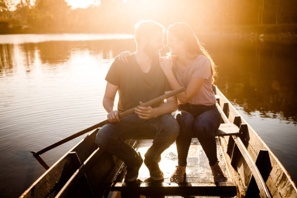 istock romantic couple in rowing boat 1266501249