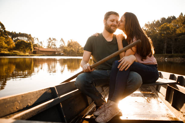 romantic couple in rowing boat