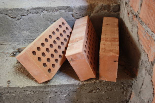 istock red brick in a dark old house under construction 1266506793