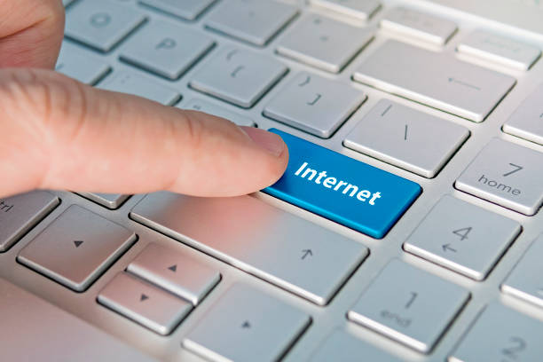 istock Mail keyboard button on grey keyboard Internet inscriptions on the grey silver keyboard button close up 1266509622