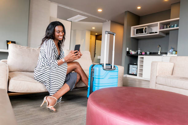 istock Afro-Colombian woman inside a house during a work trip 1266510733