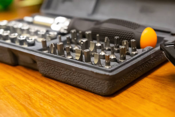istock case with interchangeable bits and nozzles of a manual screwdriver locksmith tools 1266513892