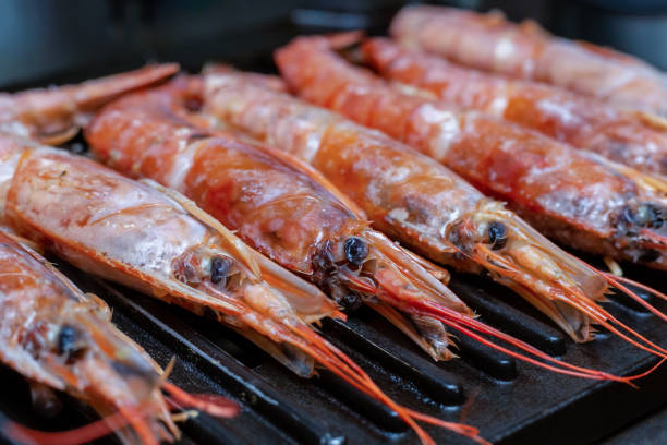 istock fresh shrimp set with the head lying on the grill parallel to each other 1266514206