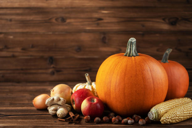 istock Autumn harvest with pumpkins 1266515111