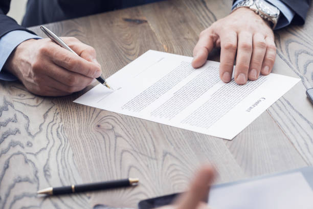 istock Businessman signing a contract 1266517959