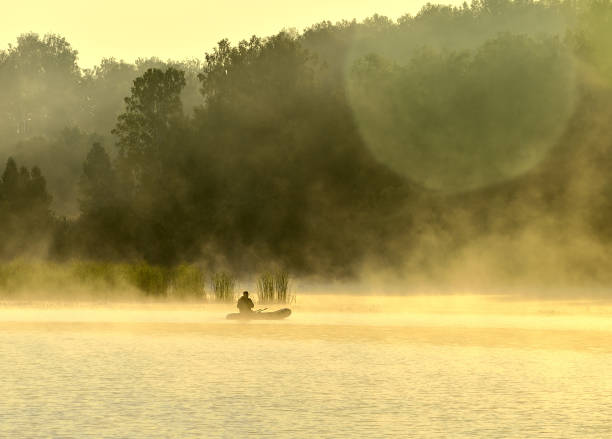 istock Fisherman's boat on the lake 1266529437