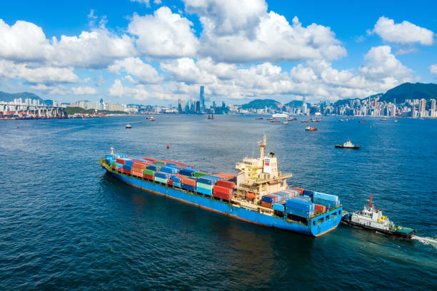 istock Container ship in export and import. International shipping cargo. 1266530198