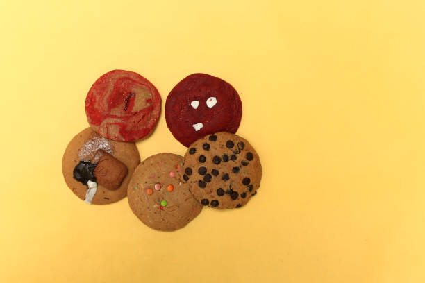 istock cookies on yellow background 1266531293