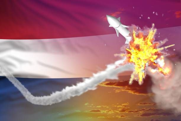 istock Netherlands intercepted nuclear warhead, modern antirocket destroys enemy missile concept, military industrial 3D illustration with flag 1266534065
