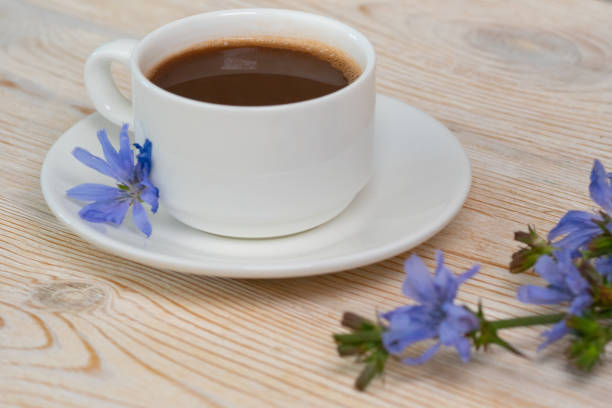 istock hot chicory drink with blue flowers on wooden table 1266541165