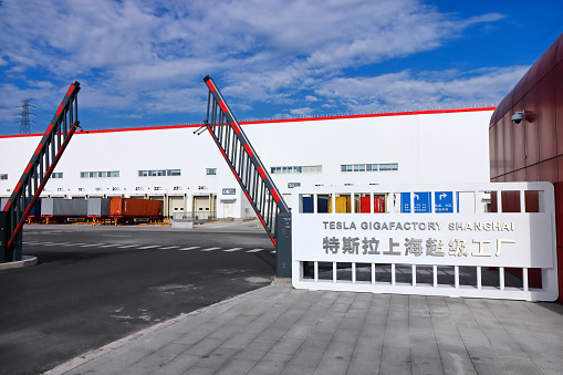Shanghai, China - August 1, 2020: Sign outside of the main entrance of Tesla Gigafactory 3 automobile plant located in Pudong District, Shanghai, China.